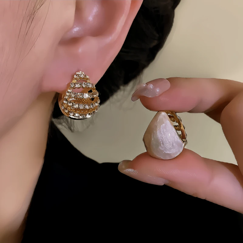 Angled view of the 14K Gold-Plated Elegant Zircon Oil Drop Double-Sided Earrings