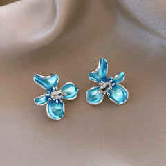 Angled view of the 14K Gold-Plated Elegant Zircon Oil Drop Flower Stud Earrings