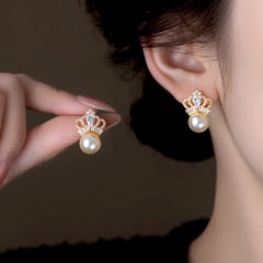 Angled view of the 14K Gold-Plated Elegant Zircon Pearl Crown Pearl Earrings