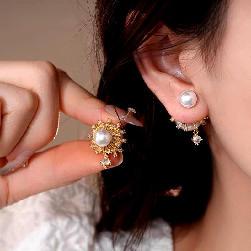 Model showcasing the dangle and style of the 14K Gold-Plated Elegant Zircon Pearl Jacket Earrings
