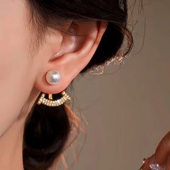 Model showcasing the dangle and style of the 14K Gold-Plated Elegant Zircon Pearl Jacket Earrings