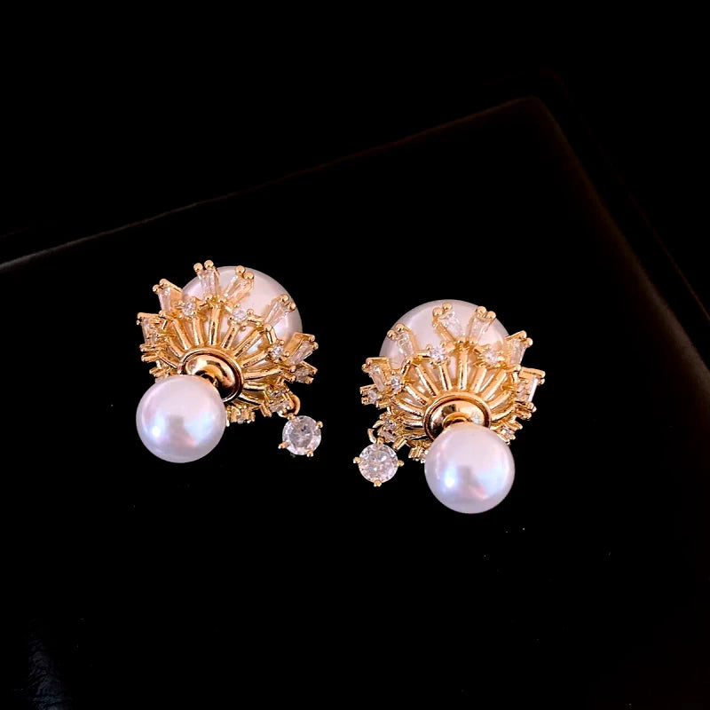 Angled view of the 14K Gold-Plated Elegant Zircon Pearl Jacket Earrings