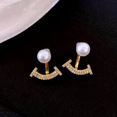 Angled view of the 14K Gold-Plated Elegant Zircon Pearl Jacket Earrings