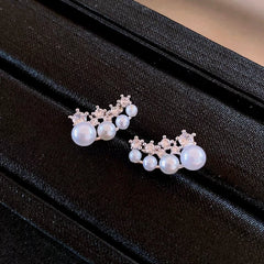 Angled view of the 14K Gold-Plated Elegant Zircon Pearl Stud Earrinhgs