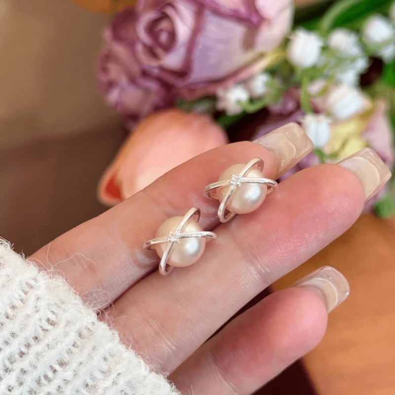 Angled view of the 14K Gold-Plated Elegant Zircon Pearl Stud Earrings