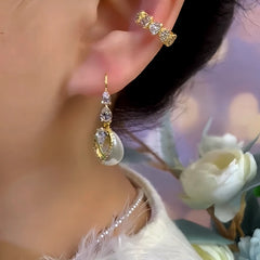 Model showcasing the dangle and style of the 14K Gold-Plated Elegant Zircon Pearl Water Drop Earrings