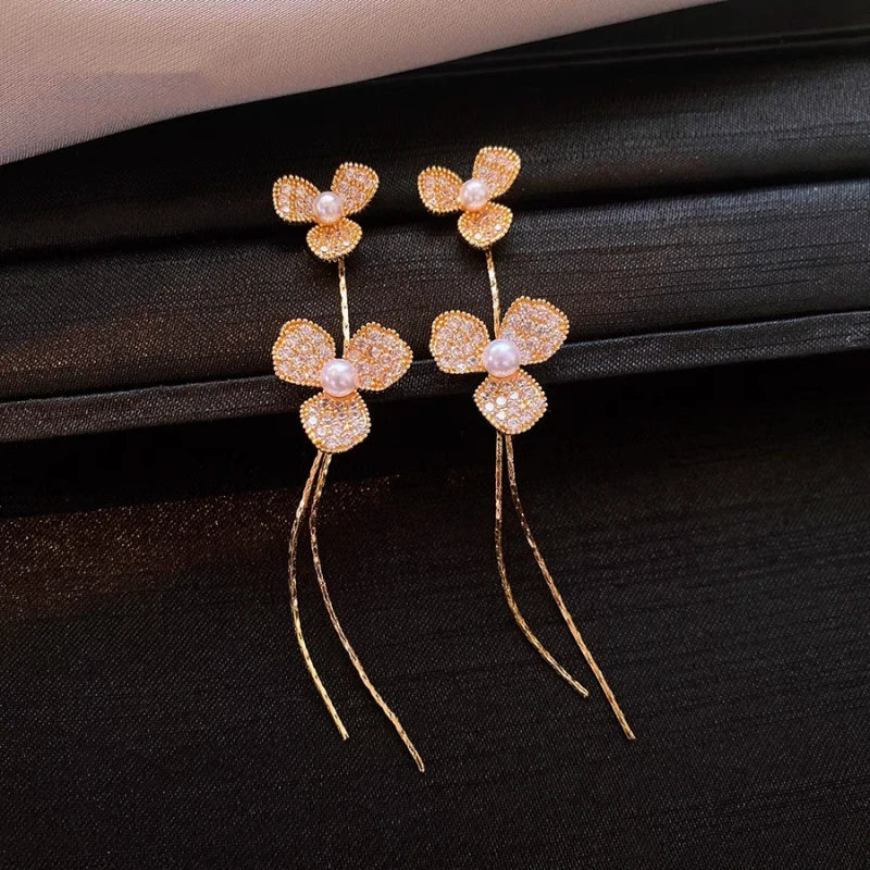 Close-up detail of the sparkling zircons and plating on the Flower Tassel Earrings