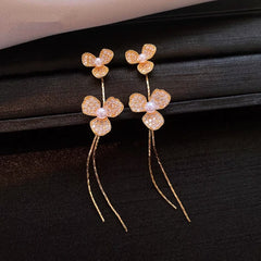Close-up detail of the sparkling zircons and plating on the Flower Tassel Earrings