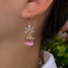 Close-up detail of the sparkling zircons and plating on the Pink Bead Earrings