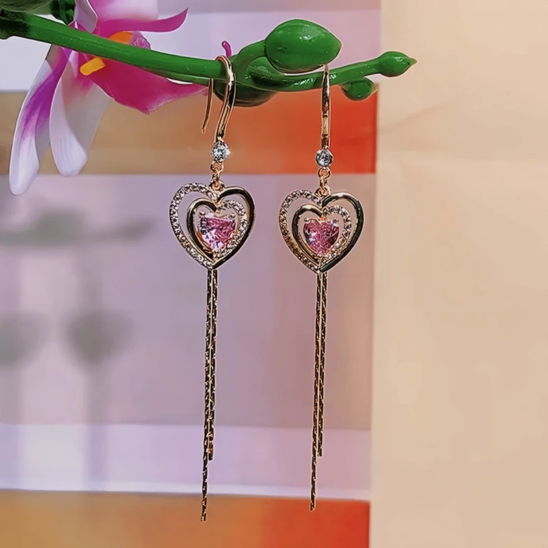 Close-up detail of the sparkling zircons and plating on the Heart Ear Hook Earrings