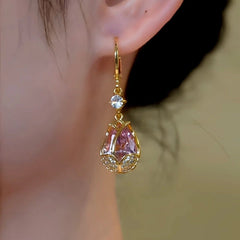 Close-up detail of the sparkling zircons and plating on the Tulip Earrings