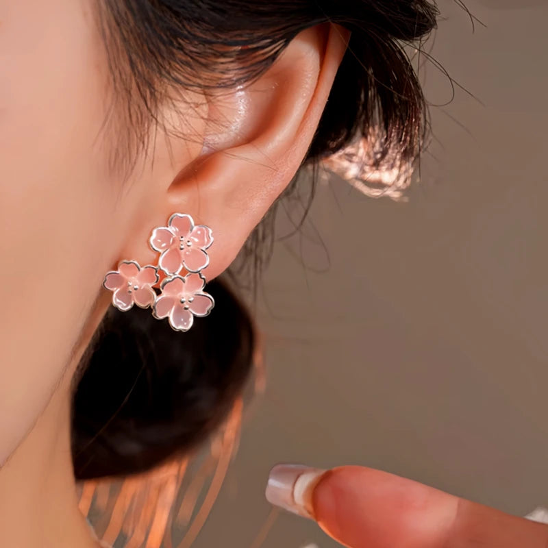 Close-up detail of the sparkling zircons and plating on the Pink Flower Studs