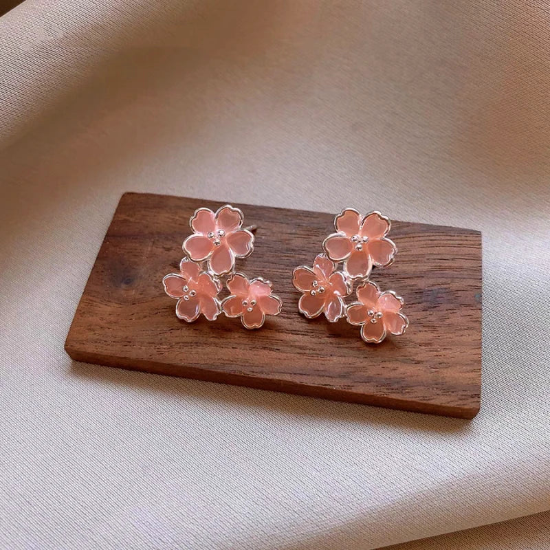 Angled view of the 14K Gold-Plated Elegant Zircon Pink Flower's Stud Earrings