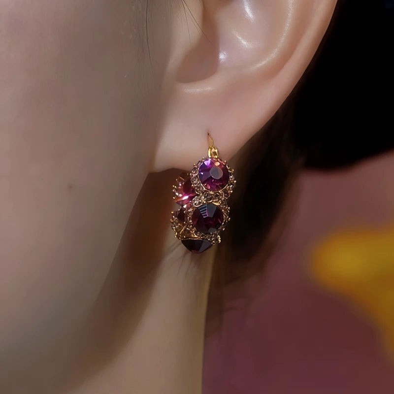 Close-up detail of the sparkling zircons and plating on the Purple Crystal Hoops