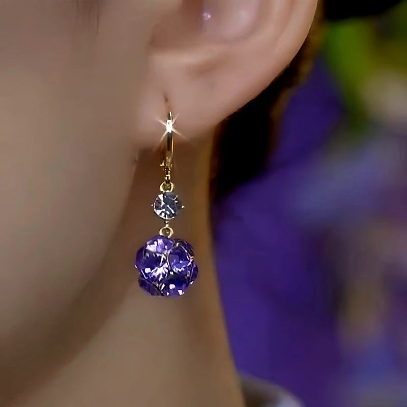 Close-up detail of the sparkling zircons and plating on the Diamond Ball Earrings