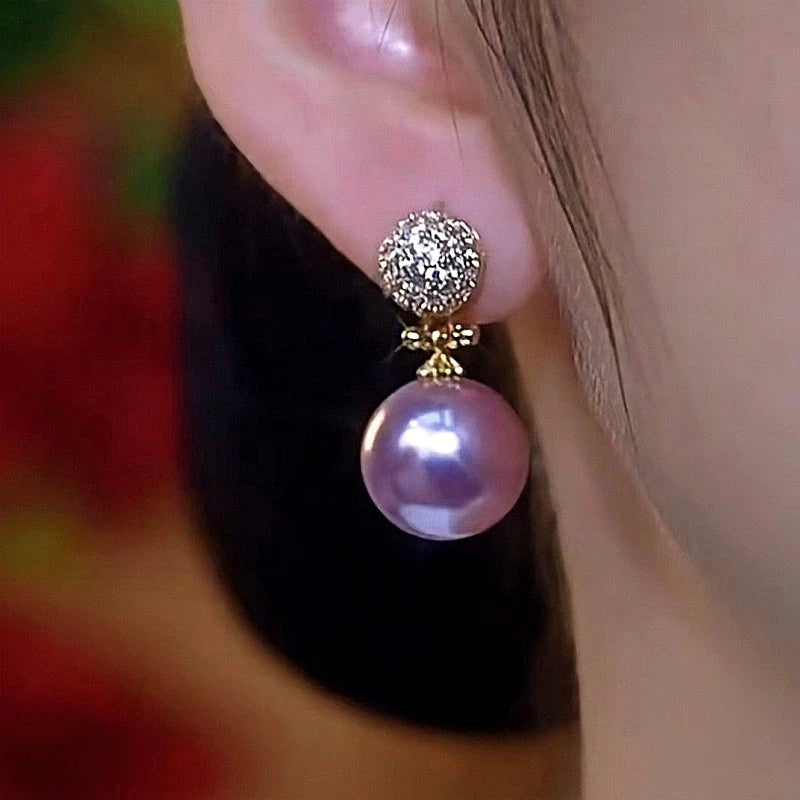 Close-up detail of the sparkling zircons and plating on the Purple Pearl Earrings