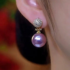 Close-up detail of the sparkling zircons and plating on the Purple Pearl Earrings