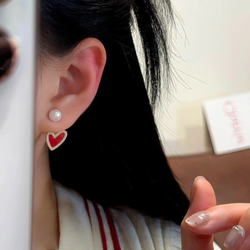Close-up detail of the sparkling zircons and plating on the Heart Bead Earrings
