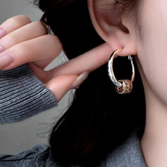 Close-up detail of the sparkling zircons and plating on the Ring Hoop Earrings