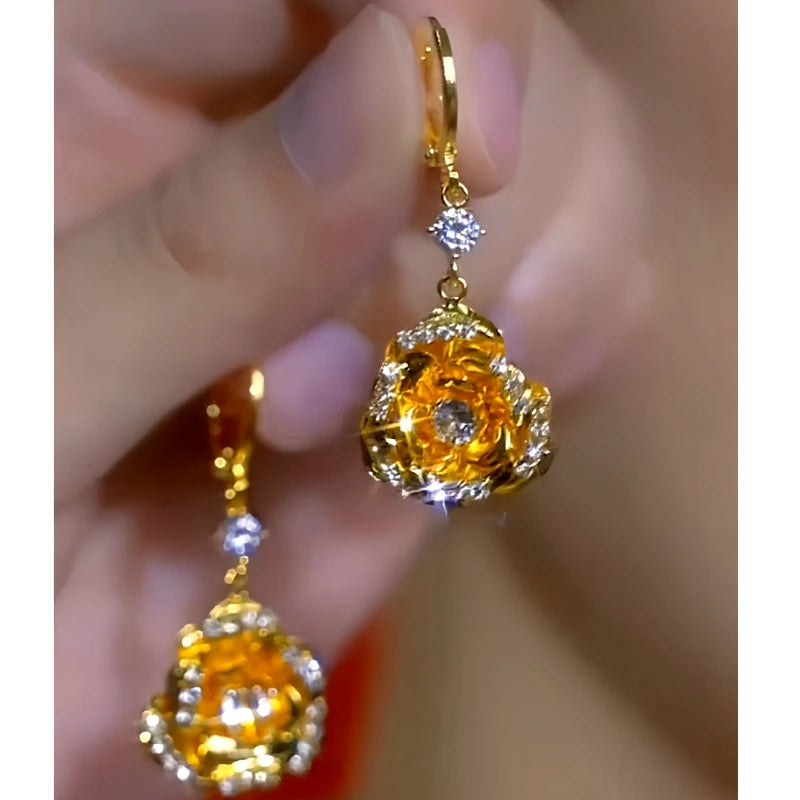 Close-up detail of the sparkling zircons and plating on the Rose Lady Earrings