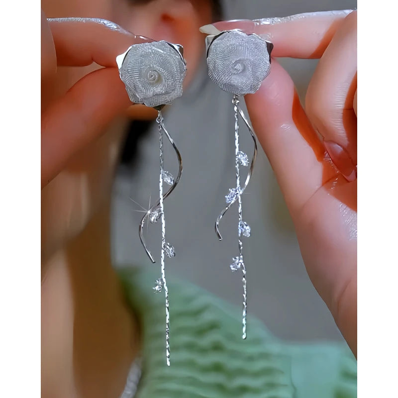 Close-up detail of the sparkling zircons and plating on the Rose Tassel Earrings