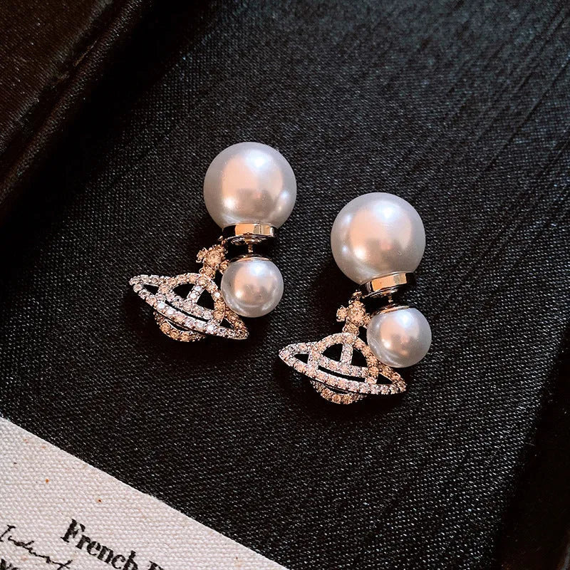 Perfect Saturn Pearl Earrings for adding glamour to any outfit