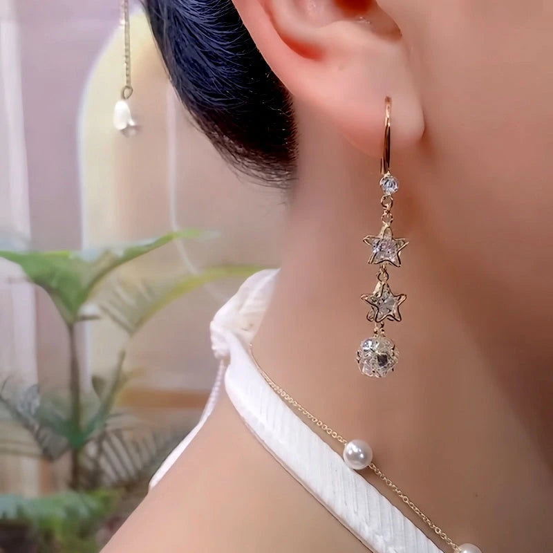 Close-up detail of the sparkling zircons and plating on the Star Ear Hook Earrings