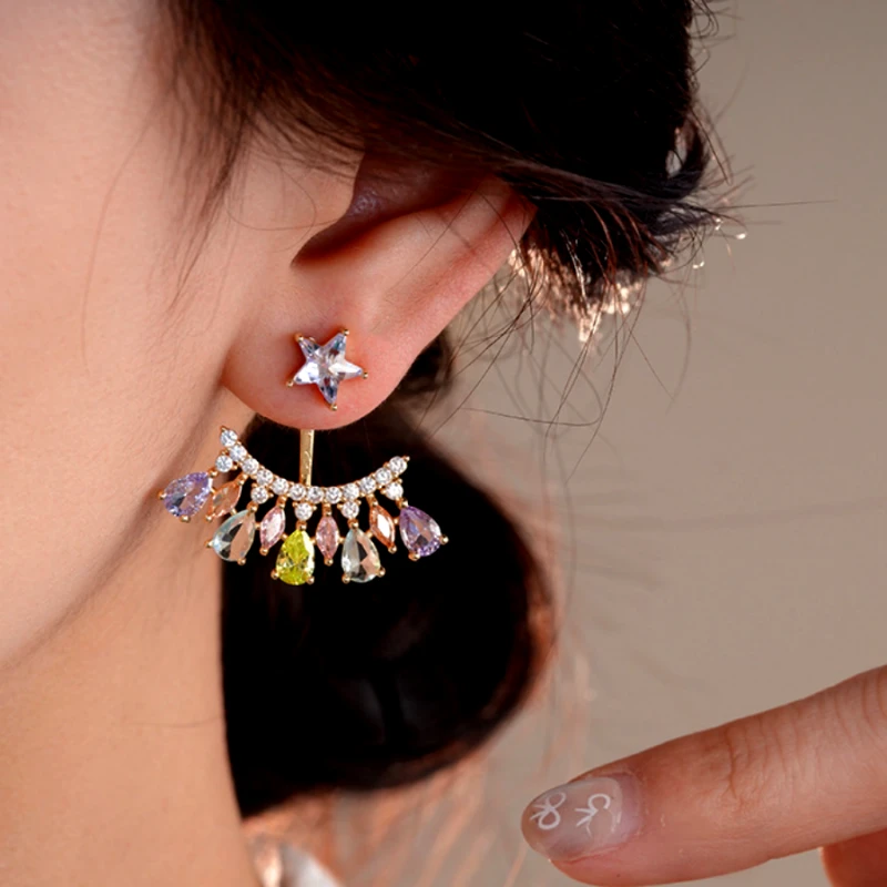 Model showcasing the dangle and style of the 14K Gold-Plated Elegant Zircon Star Colorful Water Drop Jacket Earrings