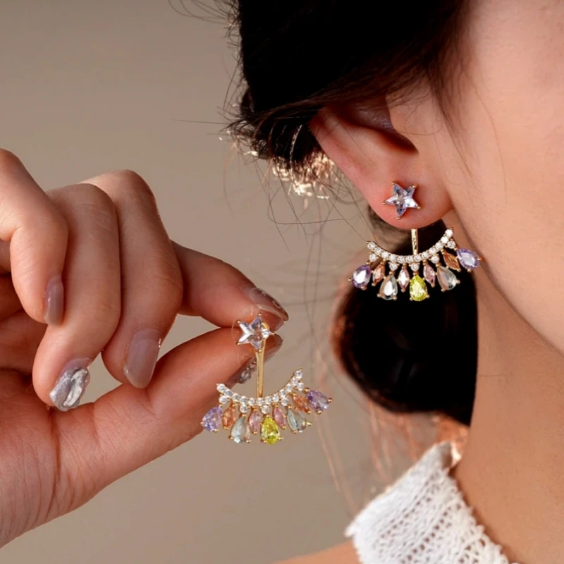 Angled view of the 14K Gold-Plated Elegant Zircon Star Colorful Water Drop Jacket Earrings