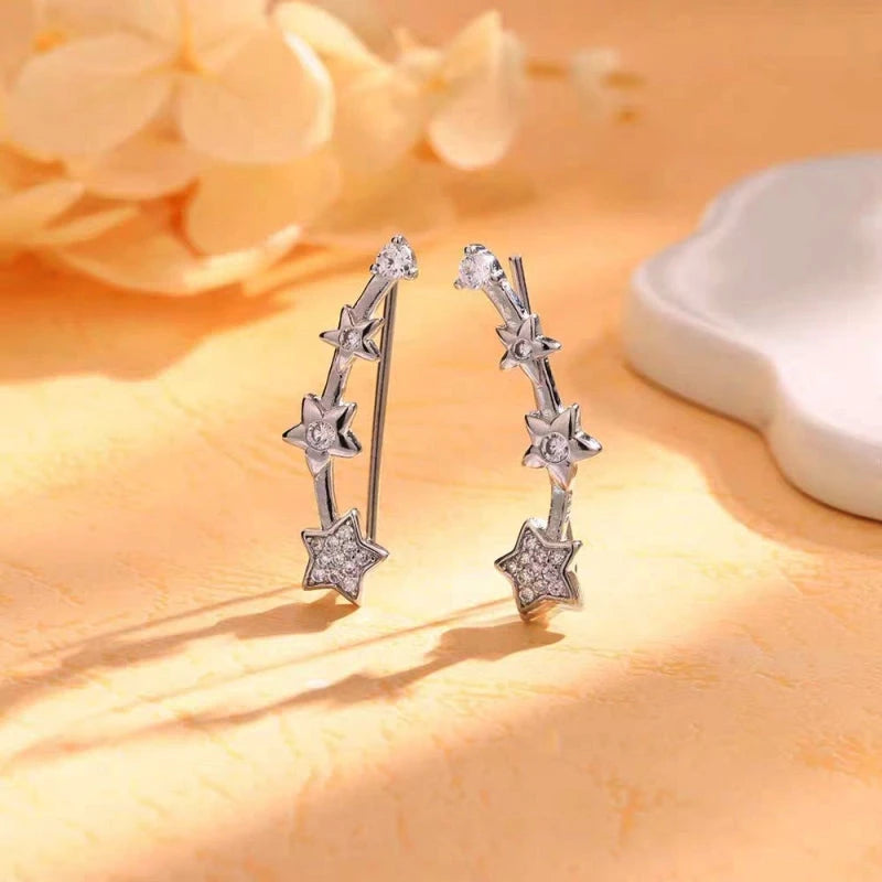 Close-up detail of the sparkling zircons and plating on the Star Crawler Earrings