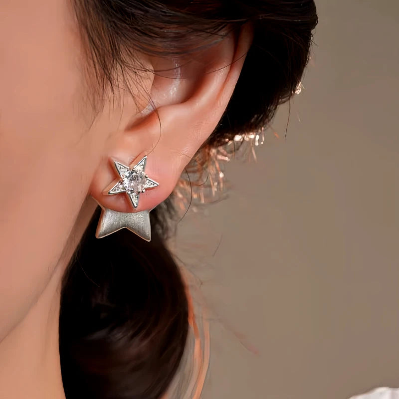 Close-up detail of the sparkling zircons and plating on the Star Jacket Earrings