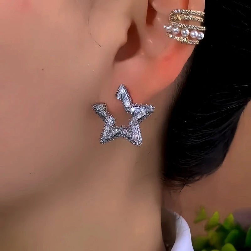 Close-up detail of the sparkling zircons and plating on the Zircon Star Studs