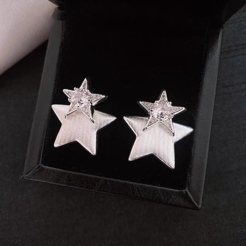 Angled view of the 14K Gold-Plated Elegant Zircon Star Earrings
