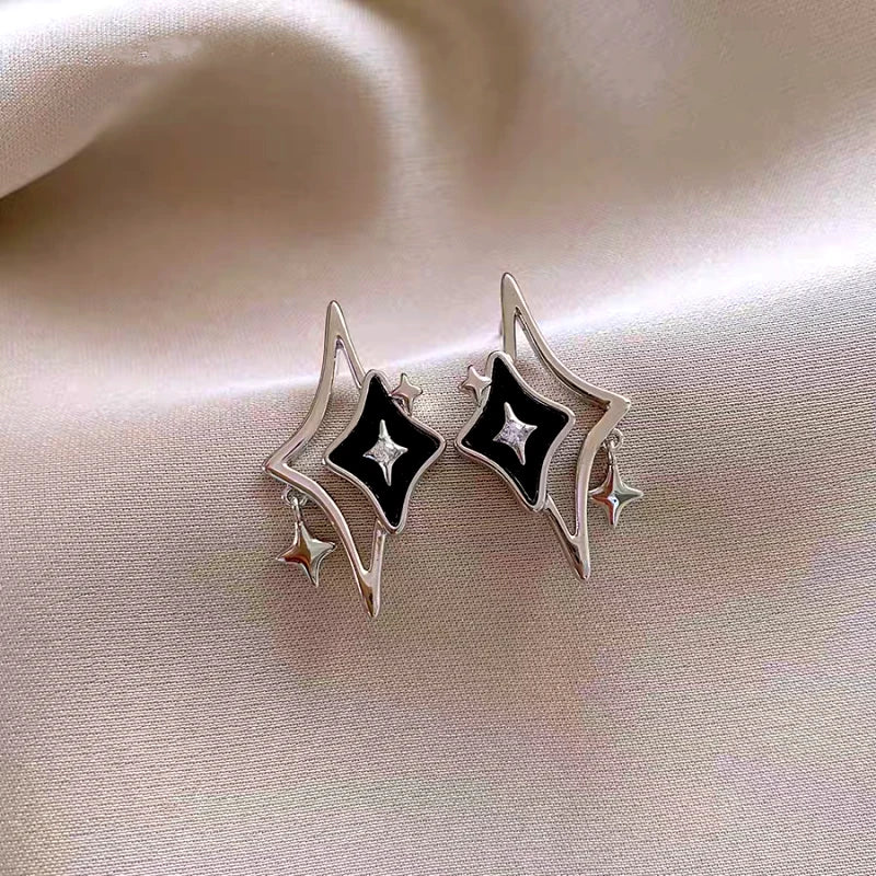 Angled view of the 14K Gold-Plated Elegant Zircon Star Earrings