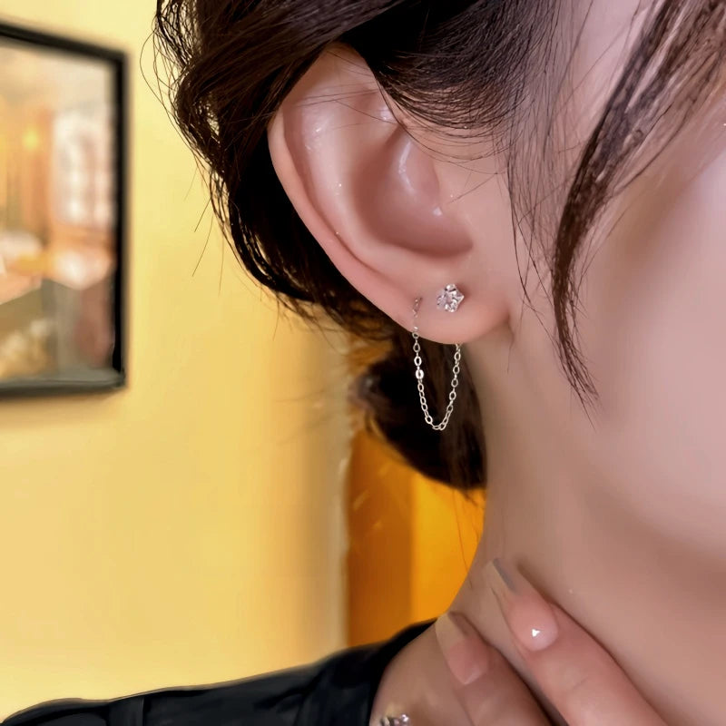 Close-up detail of the sparkling zircons and plating on the Star Threader Earrings