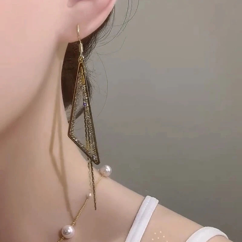 Angled view of the 14K Gold-Plated Elegant Zircon Tassel Ear Hook Earrings