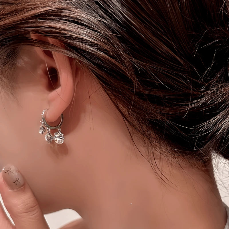 Close-up detail of the sparkling zircons and plating on the Pearl Tassel Earrings