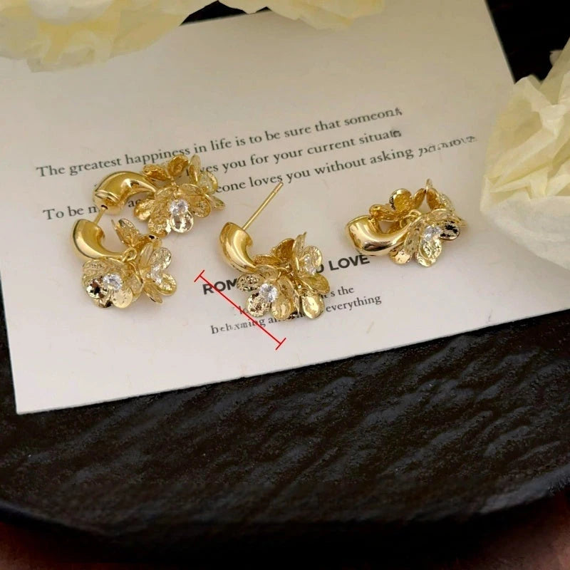 Close-up detail of the sparkling zircons and plating on the Tassel Flower Earrings