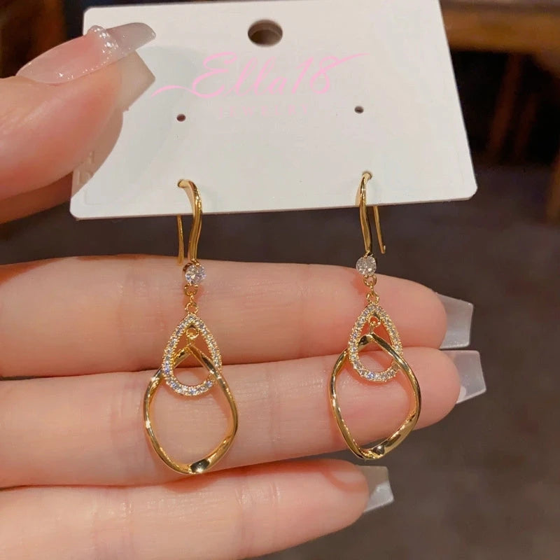 Close-up detail of the sparkling zircons and plating on the Water Drop Ear Hooks