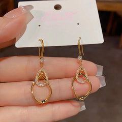 Close-up detail of the sparkling zircons and plating on the Water Drop Ear Hooks