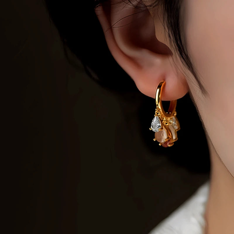 Angled view of the 14K Gold-Plated Elegant Zircon Water Drop Earrings