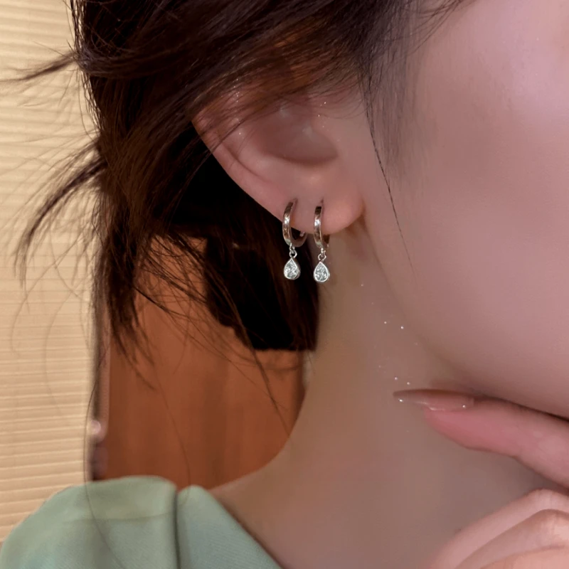 Close-up detail of the sparkling zircons and plating on the Teardrop Dangle Earrings