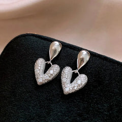 Angled view of the 14K Gold-Plated Elegant Zircon Water Drop Heart Earrings
