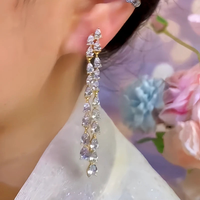 Close-up detail of the sparkling zircons and plating on the Teardrop Tassel Earrings