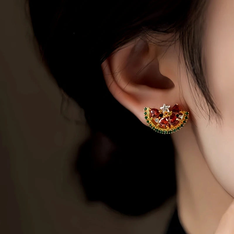 Model showcasing the dangle and style of the 14K Gold-Plated Elegant Zircon Watermelon Stud Earrings