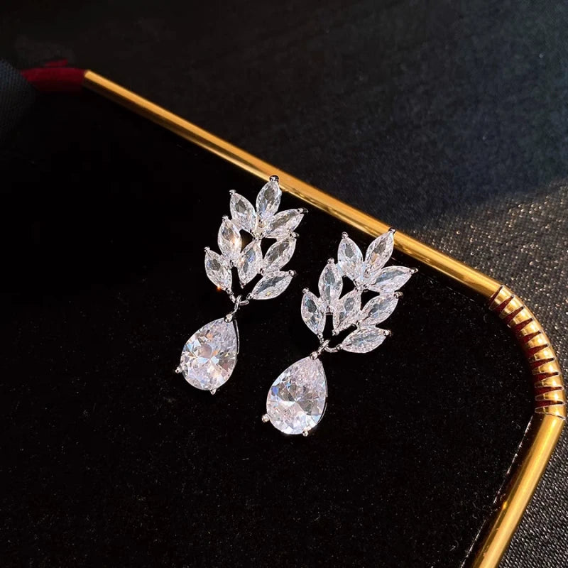 Angled view of the 14K Gold-Plated Elegant Zircon Wheat Water Drop Earrings