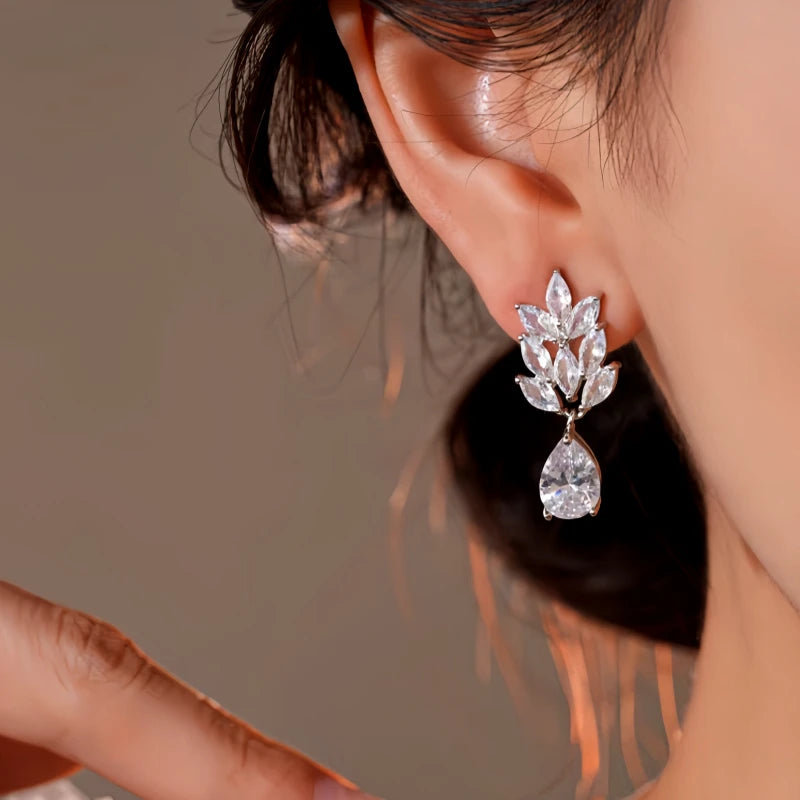 Close-up detail of the sparkling zircons and plating on the Wheat Water Drop Earrings