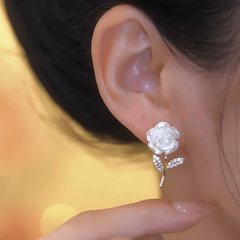 Close-up detail of the sparkling zircons and plating on the Camellia Flower Earrings