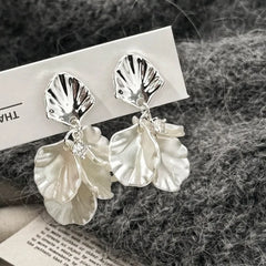 Close-up detail of the sparkling zircons and plating on the Petal Tassel Earrings