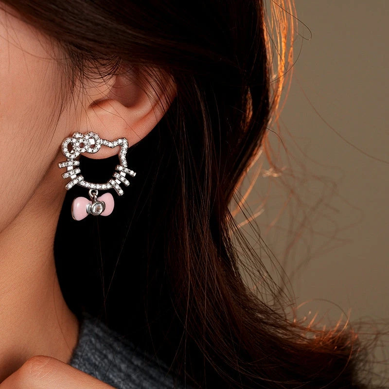 Close-up detail of the sparkling zircons and plating on the Kitten Earrings